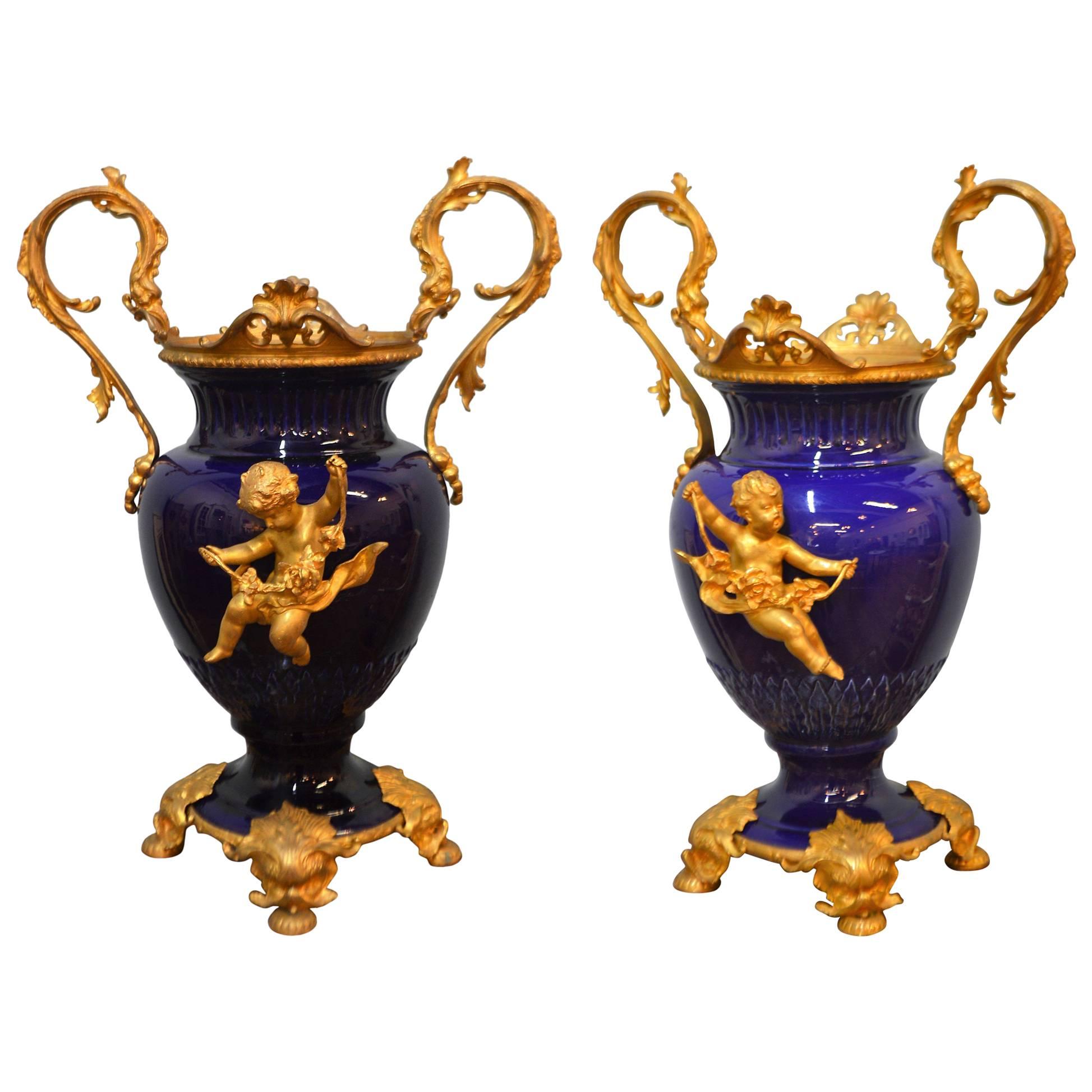 Pair of 19th Century Cobalt Blue Porcelain Urns with Fine Gilded Bronze Elements
