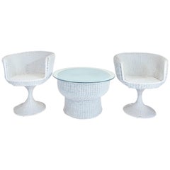 Eero Arnio Pair of Rare 1960s Rattan Tulip Swivel Chairs and Table Set