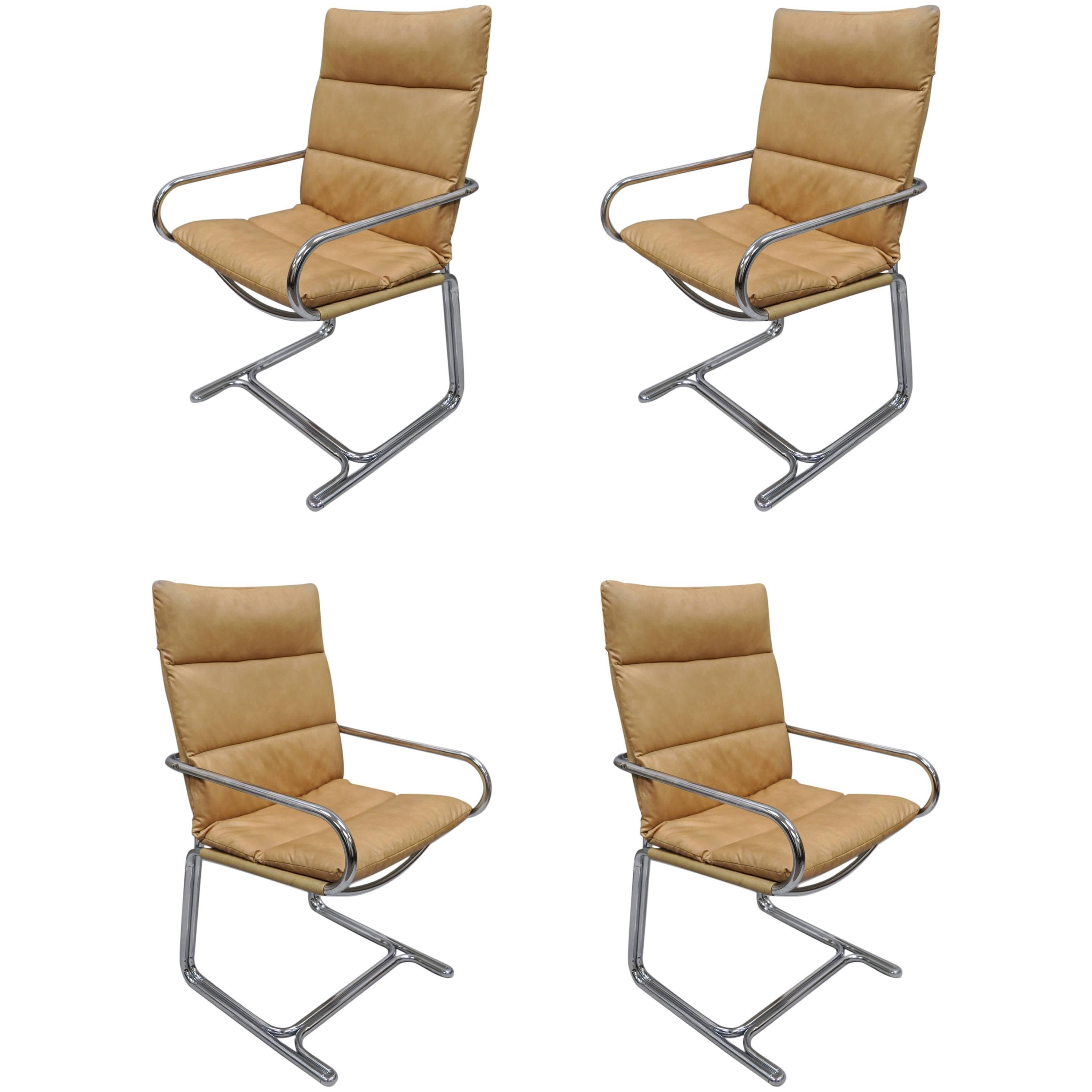 Four Tubular Chrome Cantilever Style Arm Chairs by Cosco Inc after Milo Baughman