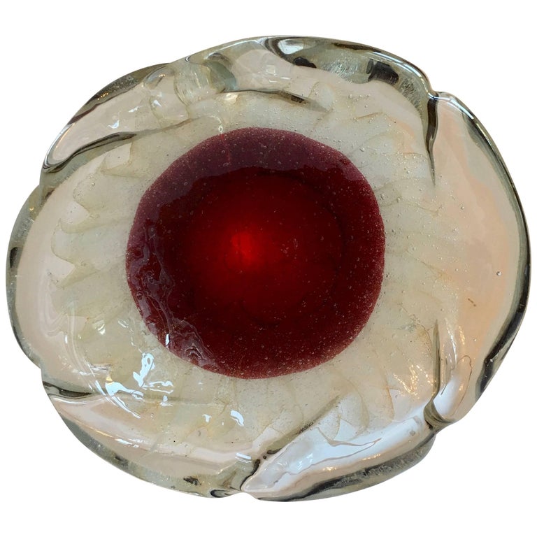 A spectacular Murano bowl - rare and desirable, this piece has a large red center with accents of 24-karat gold in the reverse.