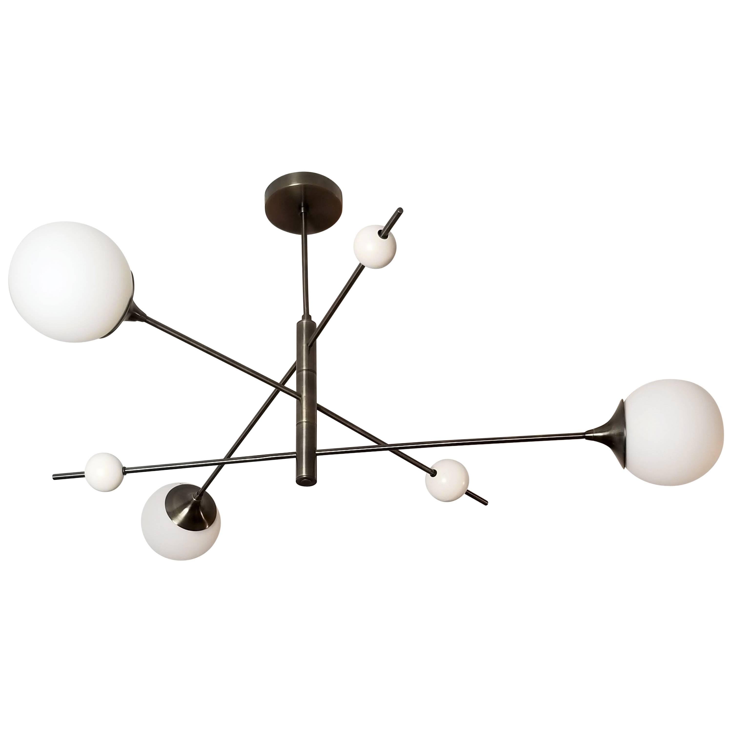Handcrafted in NYC by Blueprint Lighting, our 'Orbital' three-arm pendant is a more compact version of our wildly popular 'Orbital' six-arm chandelier. It's a commanding statement piece with design elements of both Italian and French modernism and