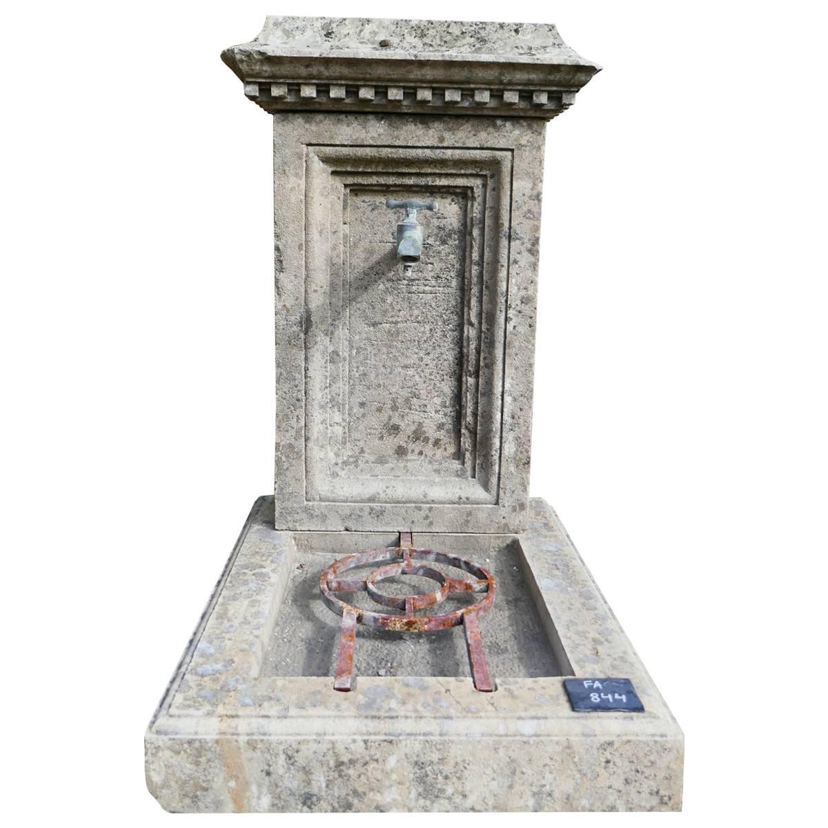 Small Garden Wall Fountain with Hand-Sculpted Pediment in Aged Stone, Provence For Sale