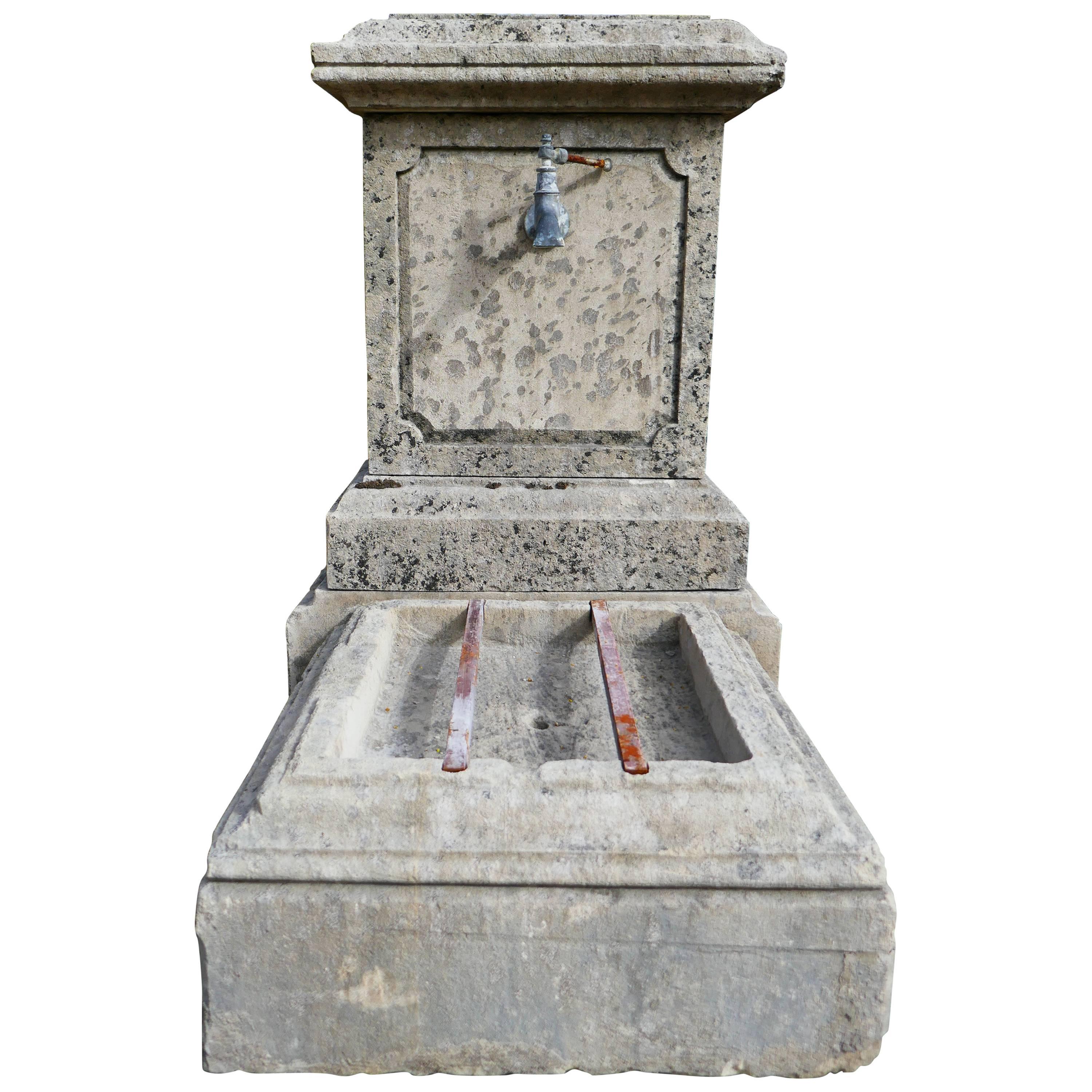 Small Garden Wall Fountain in Aged and Patinated Natural Limestone, Provence For Sale