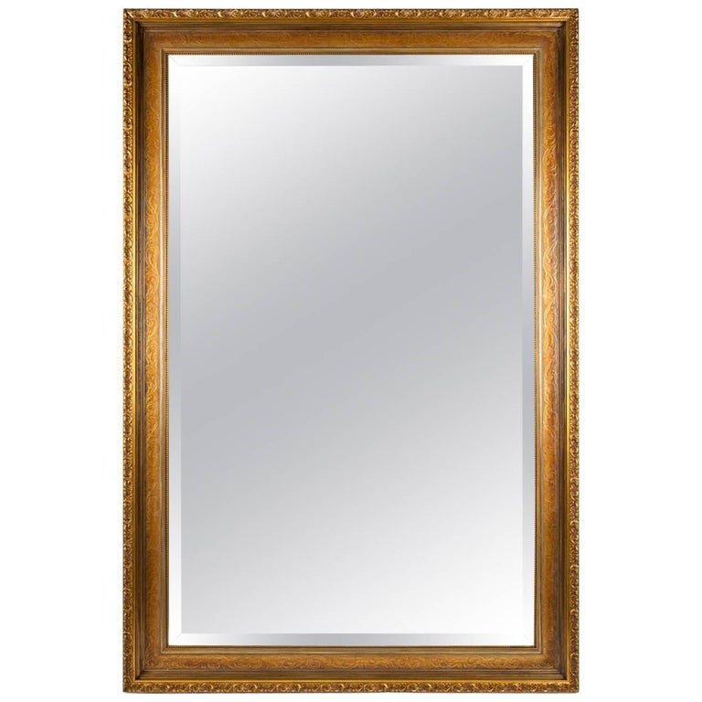 Vintage Gilded Wood Framed Hanging Wall Mirror For Sale at 1stDibs