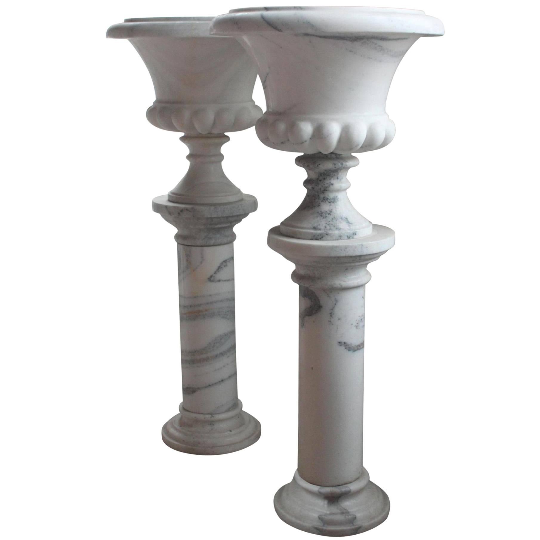 Pair of Fine White Marble Urns on Column Pedestals For Sale