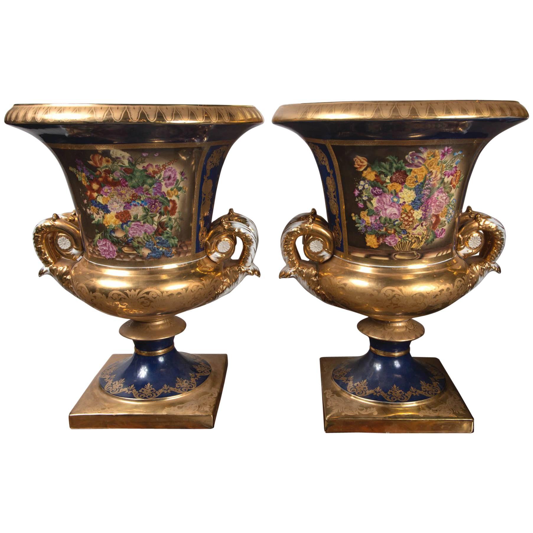 Pair of French Style Painted and Gilded Porcelain Classical Urns For Sale