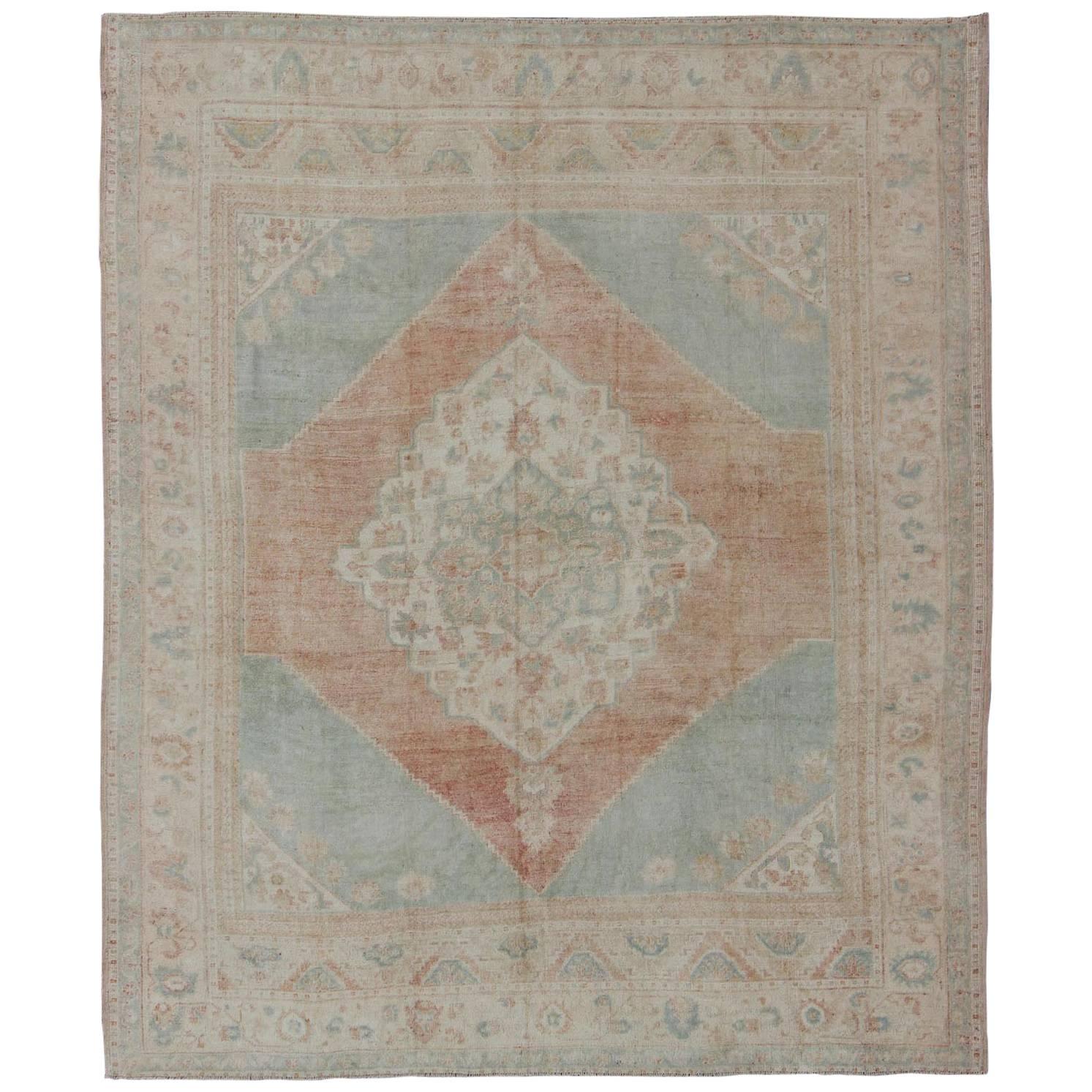 Light Blue, Topaz and Rust Vintage Turkish Oushak Rug with Layered Medallion For Sale