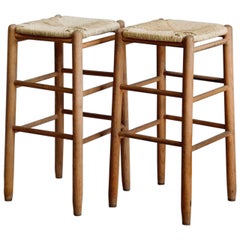 Pair of Rush Bar Stools in the Style of Charlotte Perriand