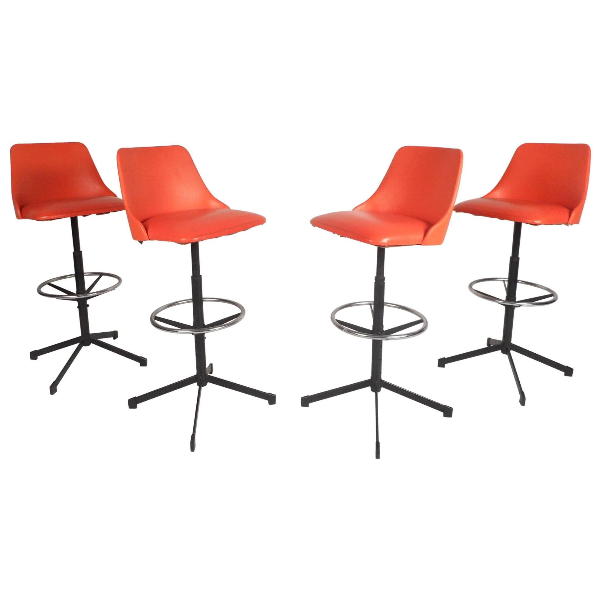 Set of Four Mid-Century Modern Swivel Bar Stools