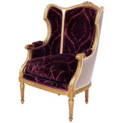 Louis XVI Style Wingchair, Carved and Giltwood, Purple Velvet, Late 19th Century