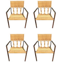 Four Adrien Gardere Woven Bamboo and Rattan Chairs