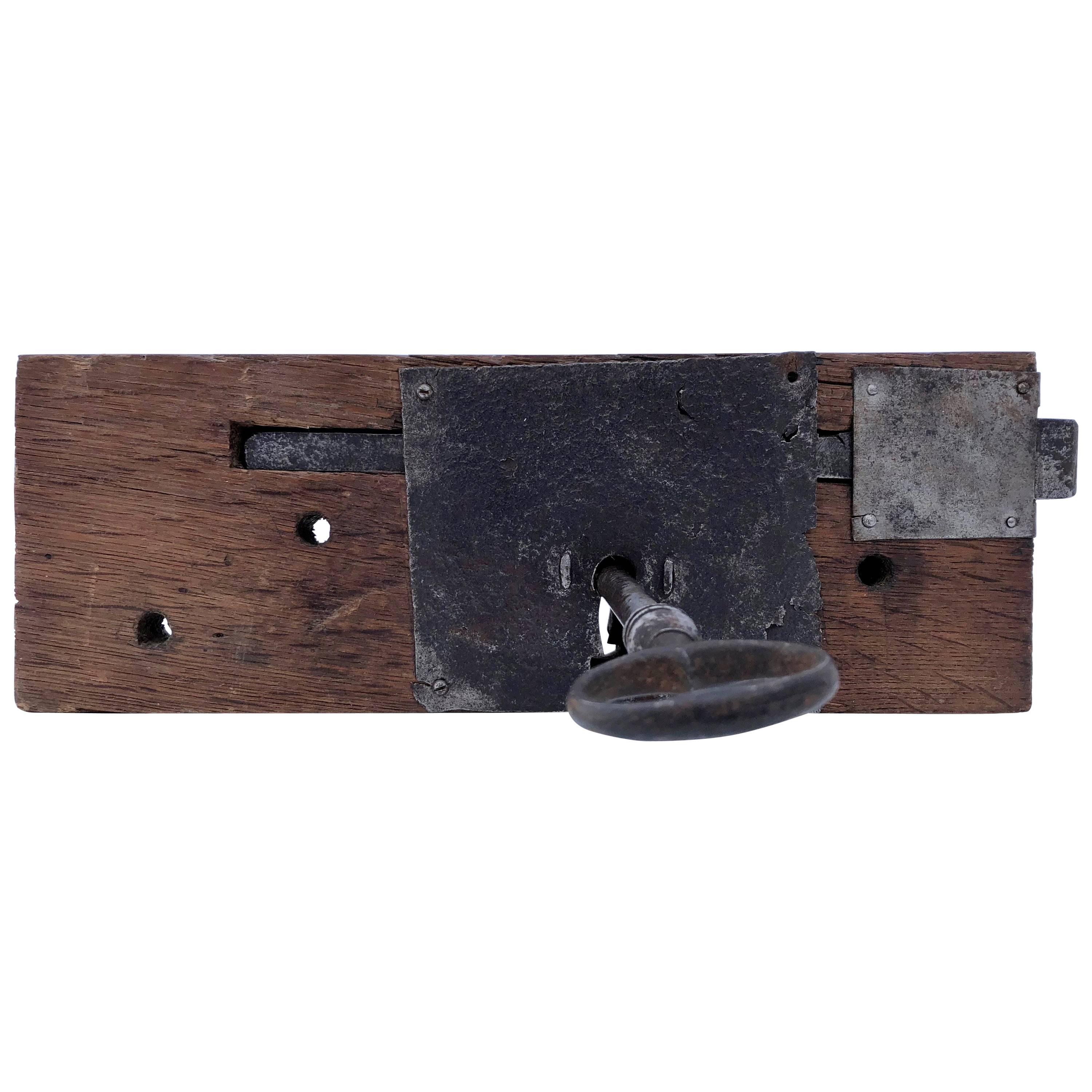 French Hand-Wrought Iron Mortise Mount Lock with Key on Wood Base, 1700s-1800s