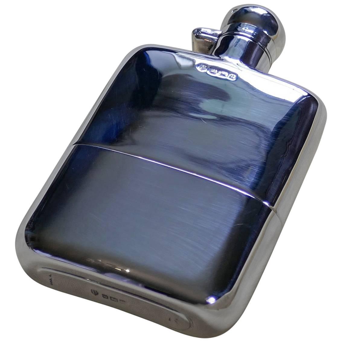 A Solid Silver Hall Marked Hip Flask and Cup by Stewart Dawson & Co, 1912