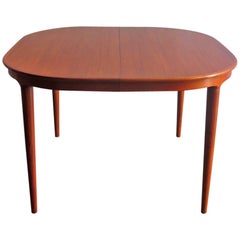 Skovman and Andersen teak dinning table with two extensions