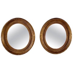 Paire de miroirs en bois doré sculpté et gesso du 19ème siècle