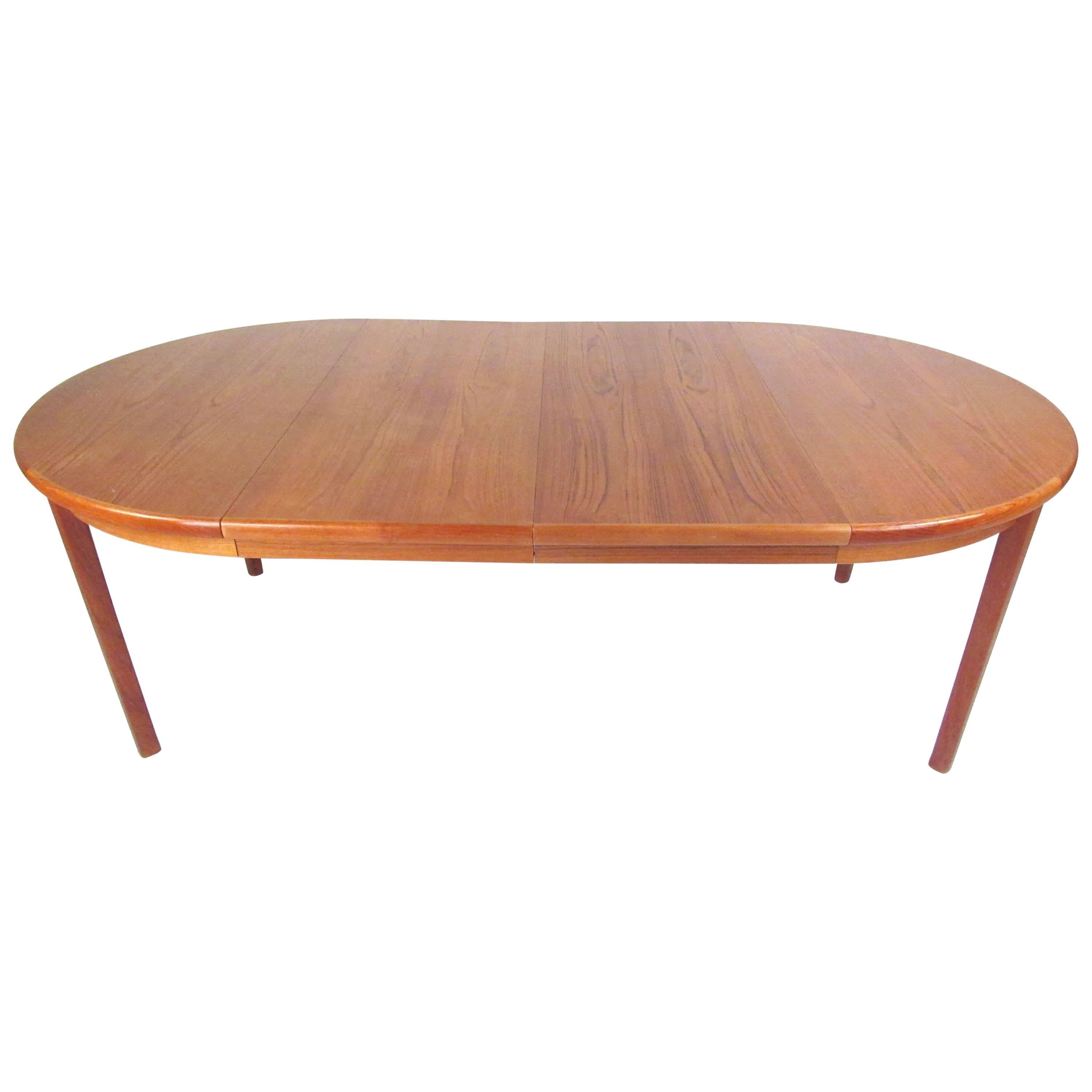Scandinavian Modern Teak Dining Table with Two Leaves