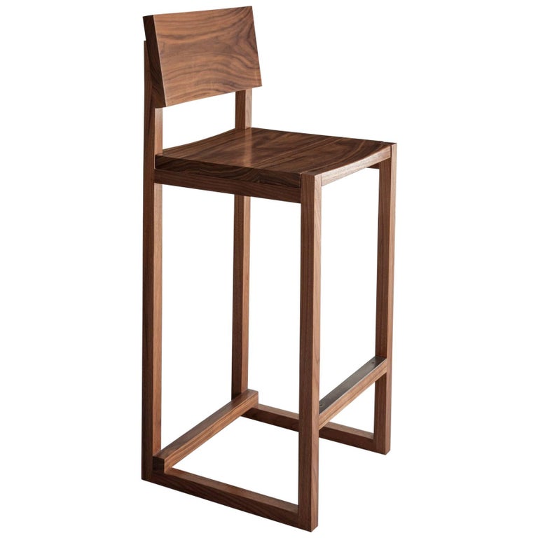 SQ bar stool in walnut, new, offered by David Gaynor Design