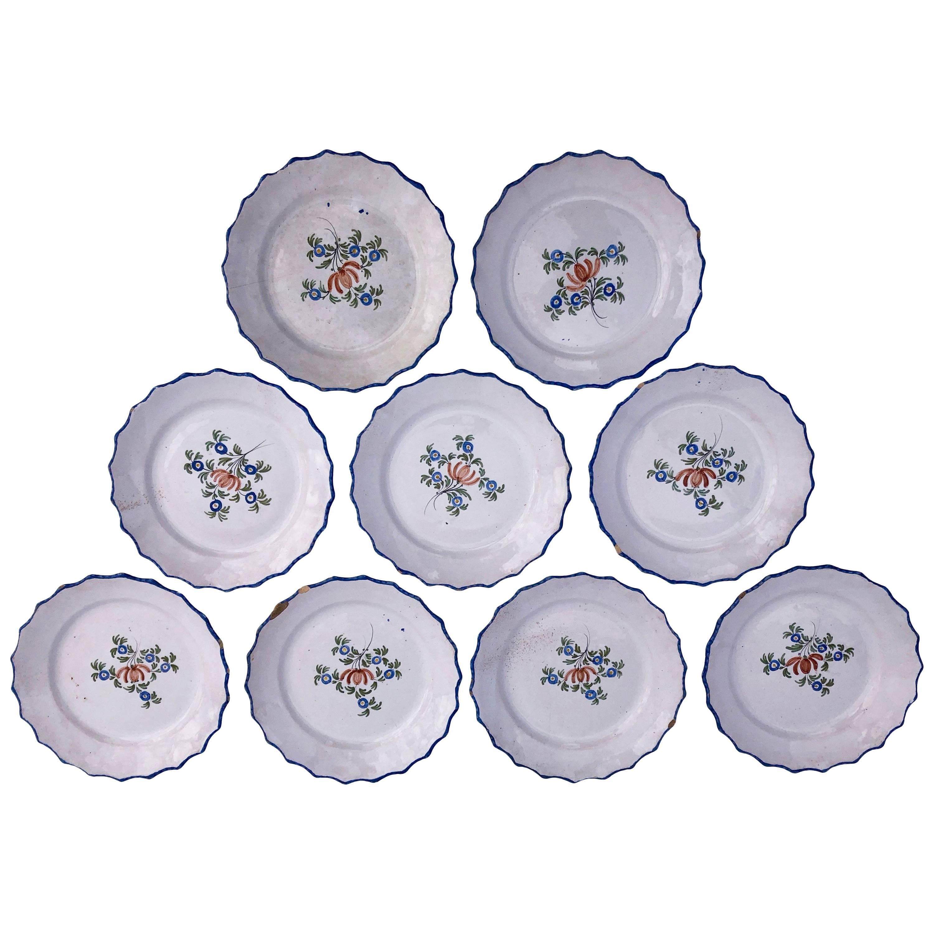 Set of Nine French Chantilly Faïence Plates, Painted Flowers Blue Trim Mid-1700s For Sale
