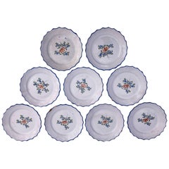 Set of Nine French Chantilly Faïence Plates, Painted Flowers Blue Trim Mid-1700s
