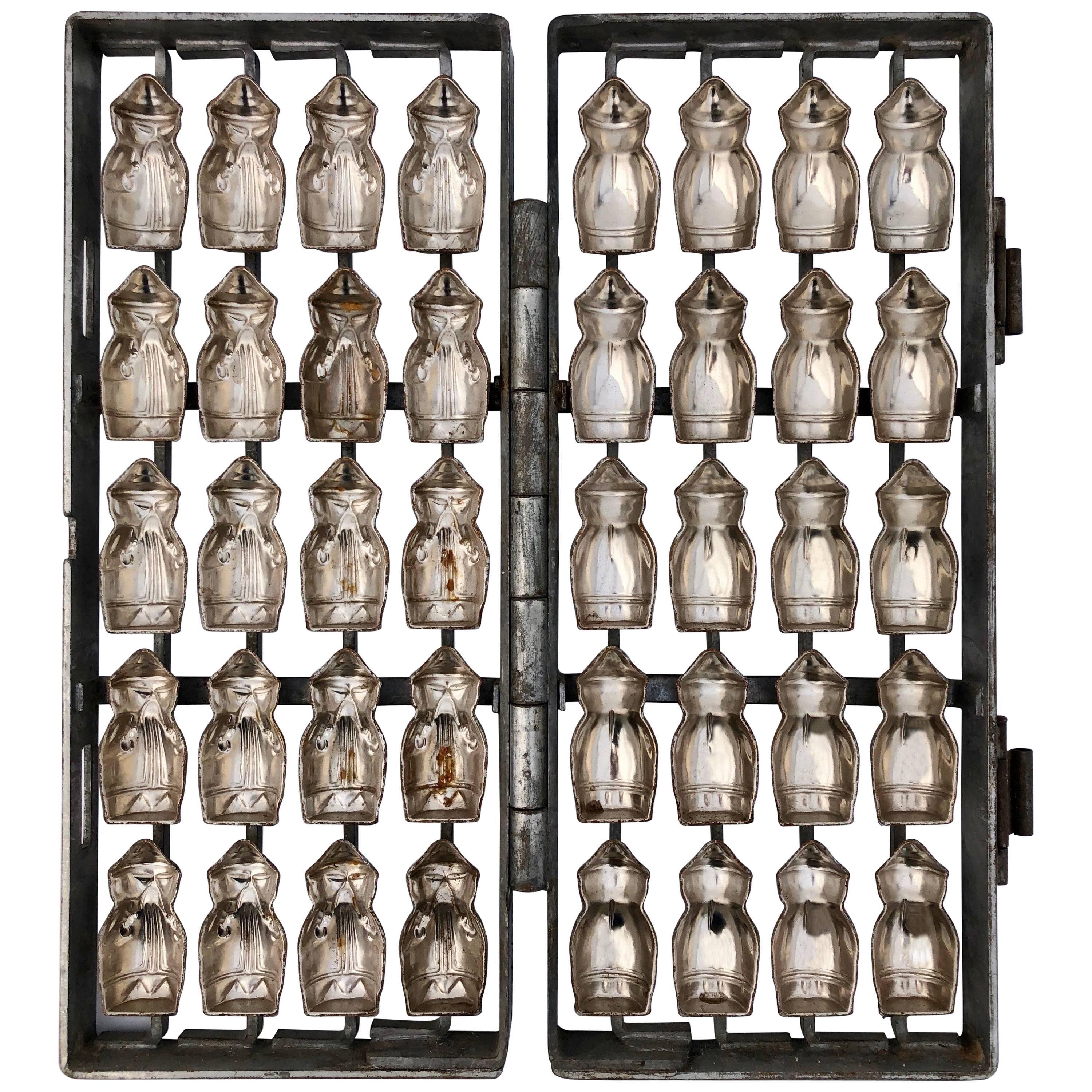 German Herman Walter Metal Chocolate Mold to Make 20 Little Figures For Sale