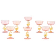 Eight Handblown Venetian/Murano Pink Rose Champagne Coupes with Figural Dolphins