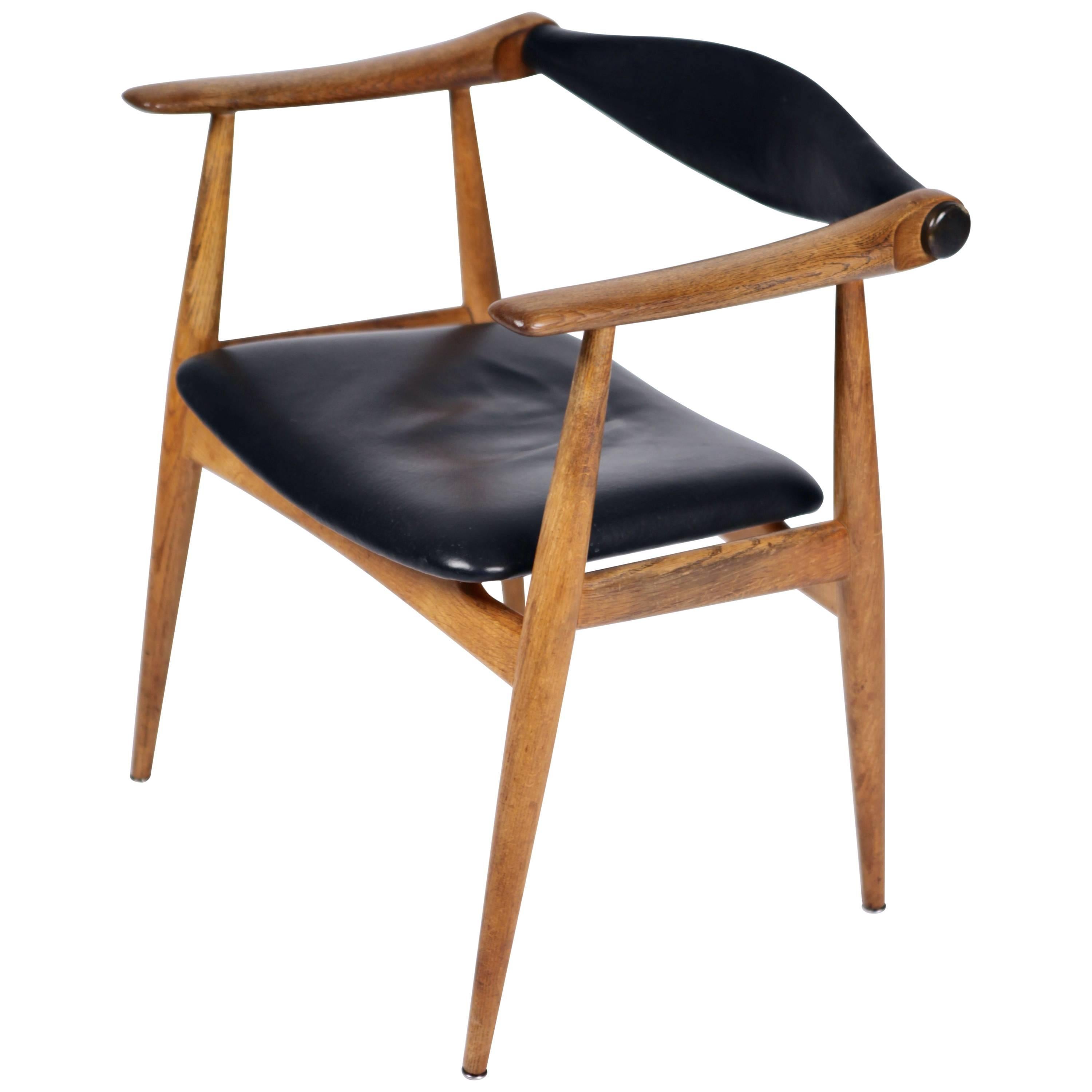 Hans Wegner, the Yoke Chair CH34, Oak and Black Leather