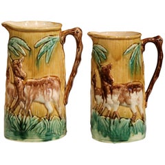 Pair of 19th Century French Hand-Painted Barbotine Wine Pitchers with Deer