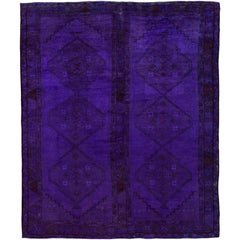 Tapis vintage violet surteint de style Khotan