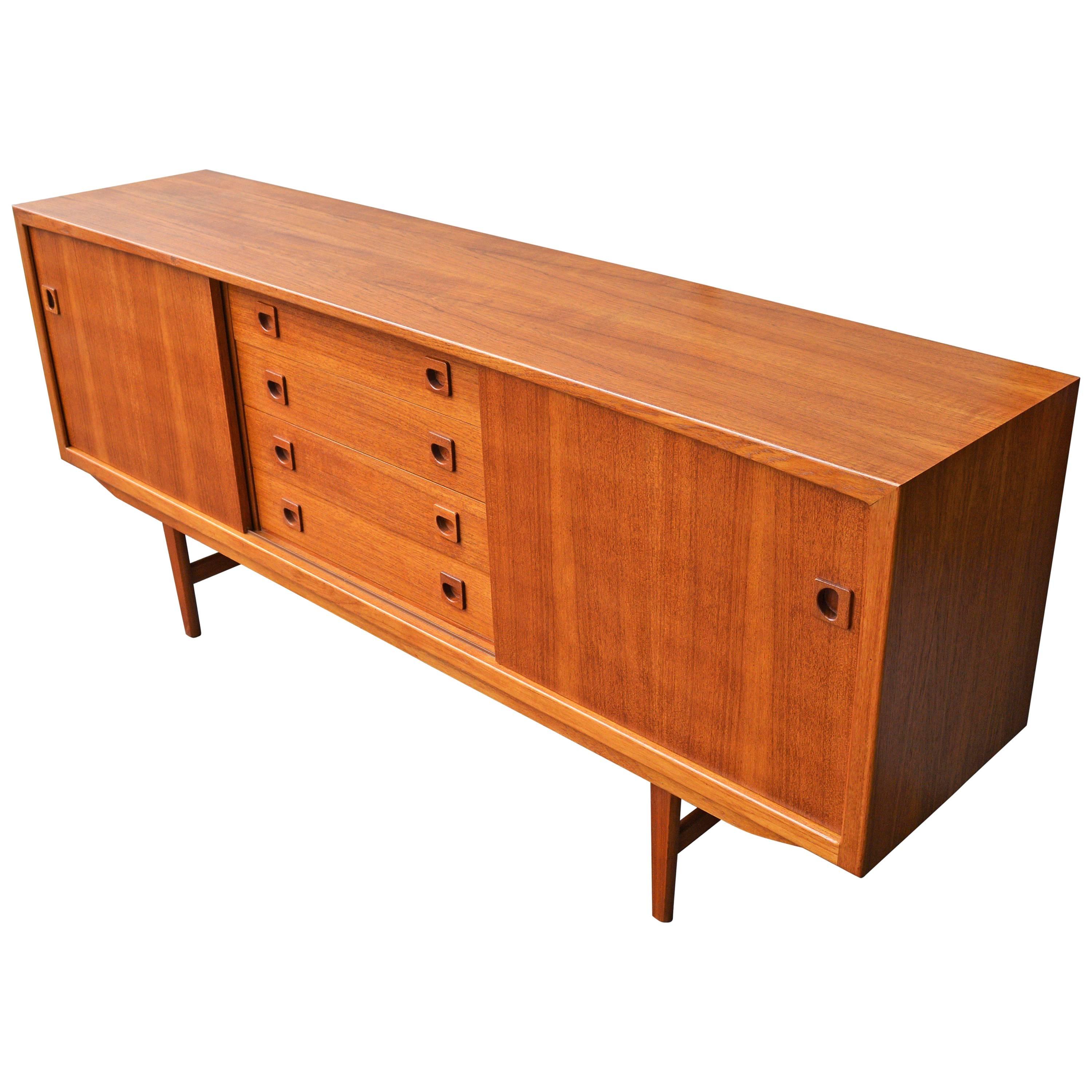 Danish Modern Teak Buffet / Credenza with Centre Drawers and Sword Blade Legs