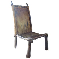 Chaise africaine primitive Bois et cuir:: vers 1900