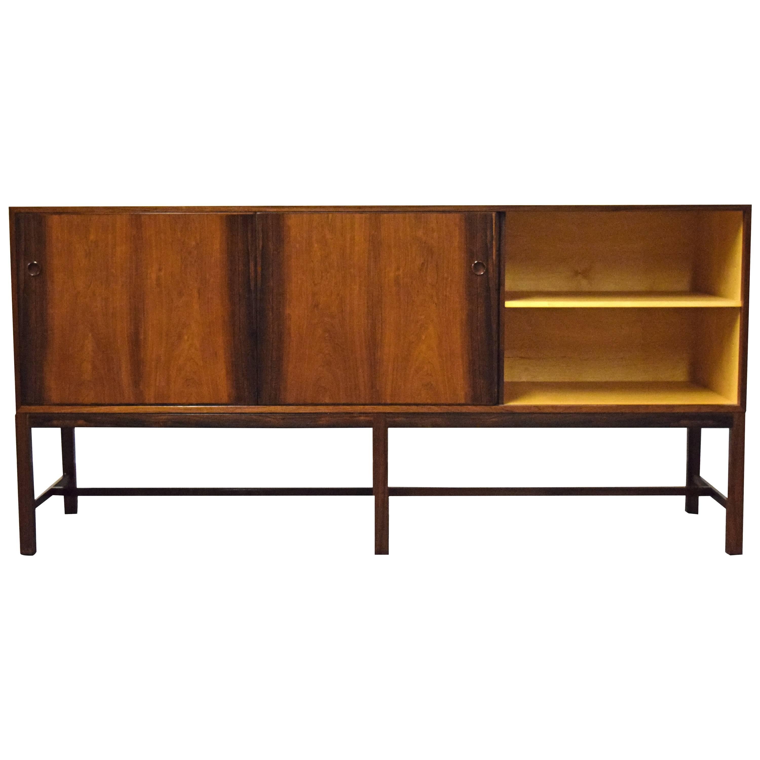 Danish modern rosewood credenza 

Sideboard made in Denmark and imported by John Stuart.