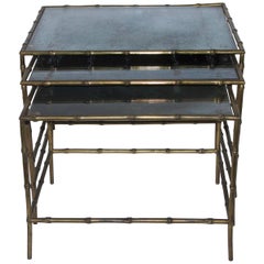 Maison Baguès Style Three Nesting Tables, Bronze and Aged Glass Top, circa 1970