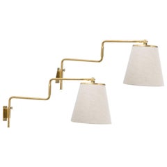Pair of Paavo Tynell Wall Lights in Brass and Fabric 1950s