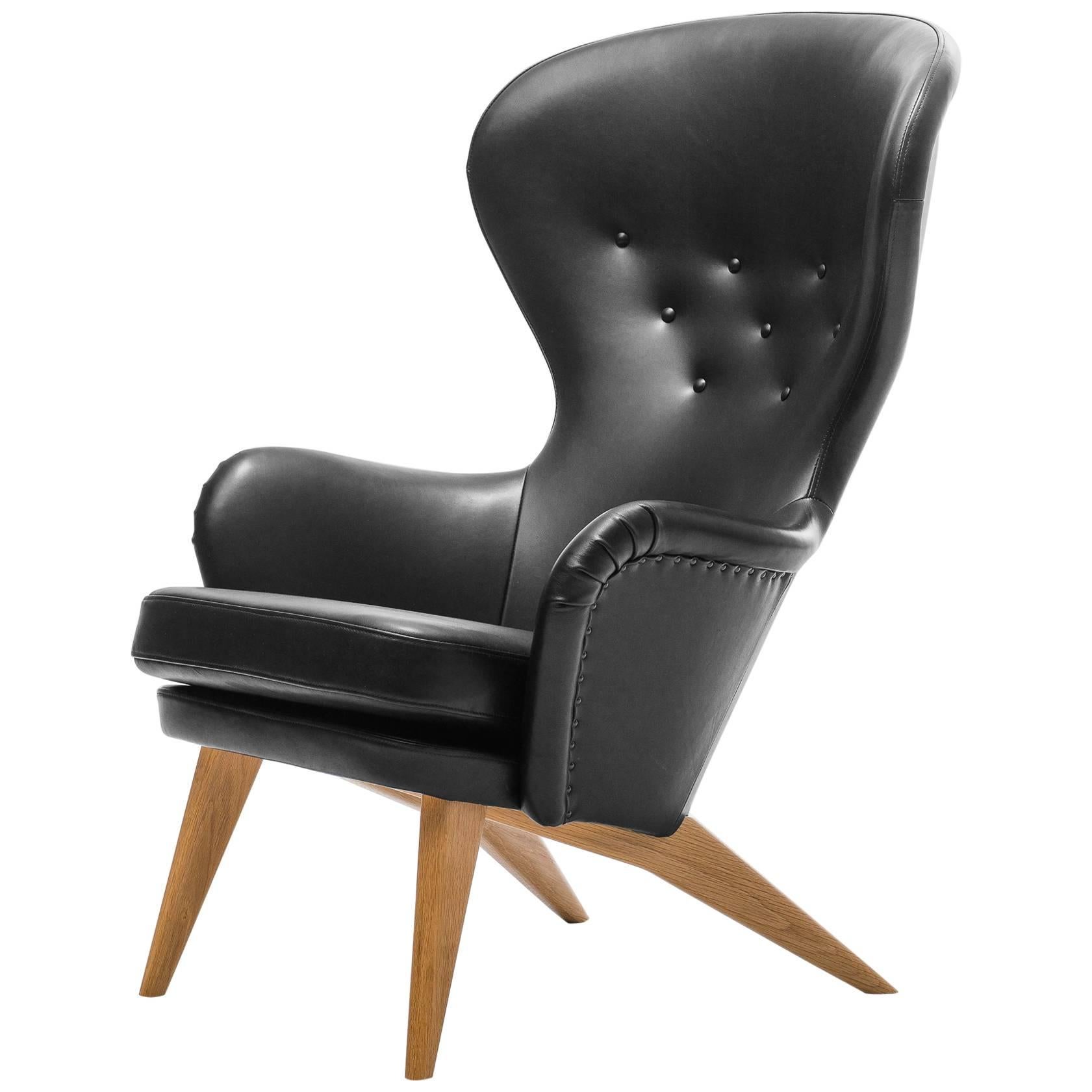 Siesta Lounge Chair in Black Leather Design by Carl Gustav Hiort af Ornäs For Sale