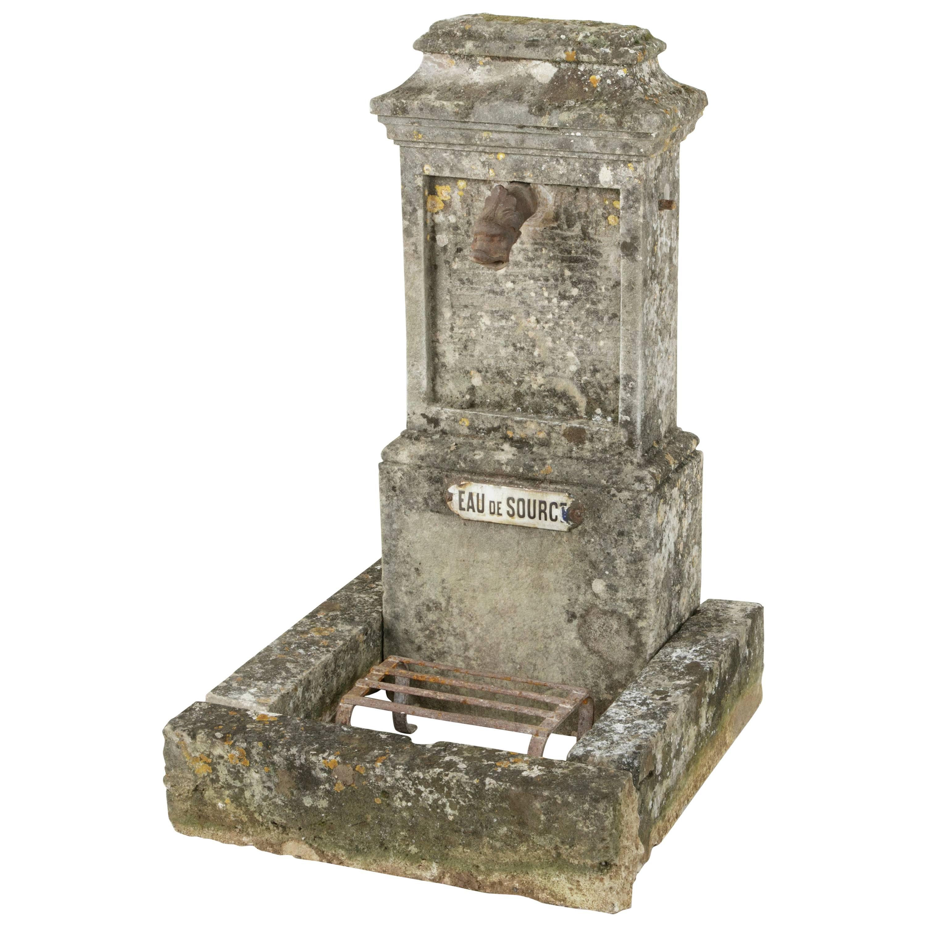 19th Century French Limestone Village Fountain with Iron Spout and Grate