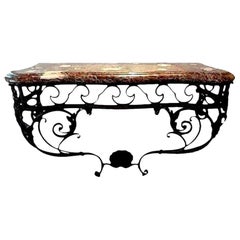 Ancienne table console en fer forgé de style Régence française avec plateau en marbre