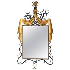 Large Parcel-Gilt and Black Painted Iron Mirror after Model by Gilbert Poillerat