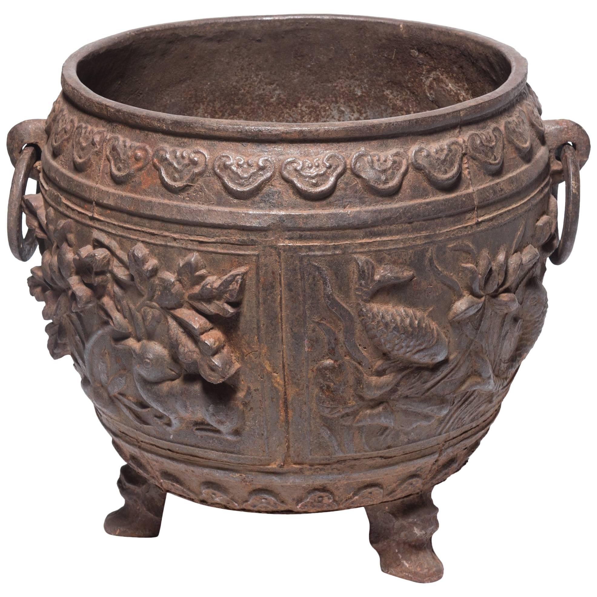 Large Chinese Cast Iron Urn with Heavy Relief