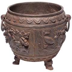 Large Chinese Cast Iron Urn with Heavy Relief