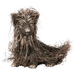 Modello di cane in argento di stile Buccellati