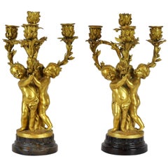 Pair of 19th Century French Doré Bronze Putti Candelabras with Agate Bases