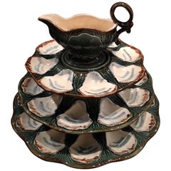 Set of Three Majolica Long Champ Oyster Platters and a Sauce Boat, 19th Century