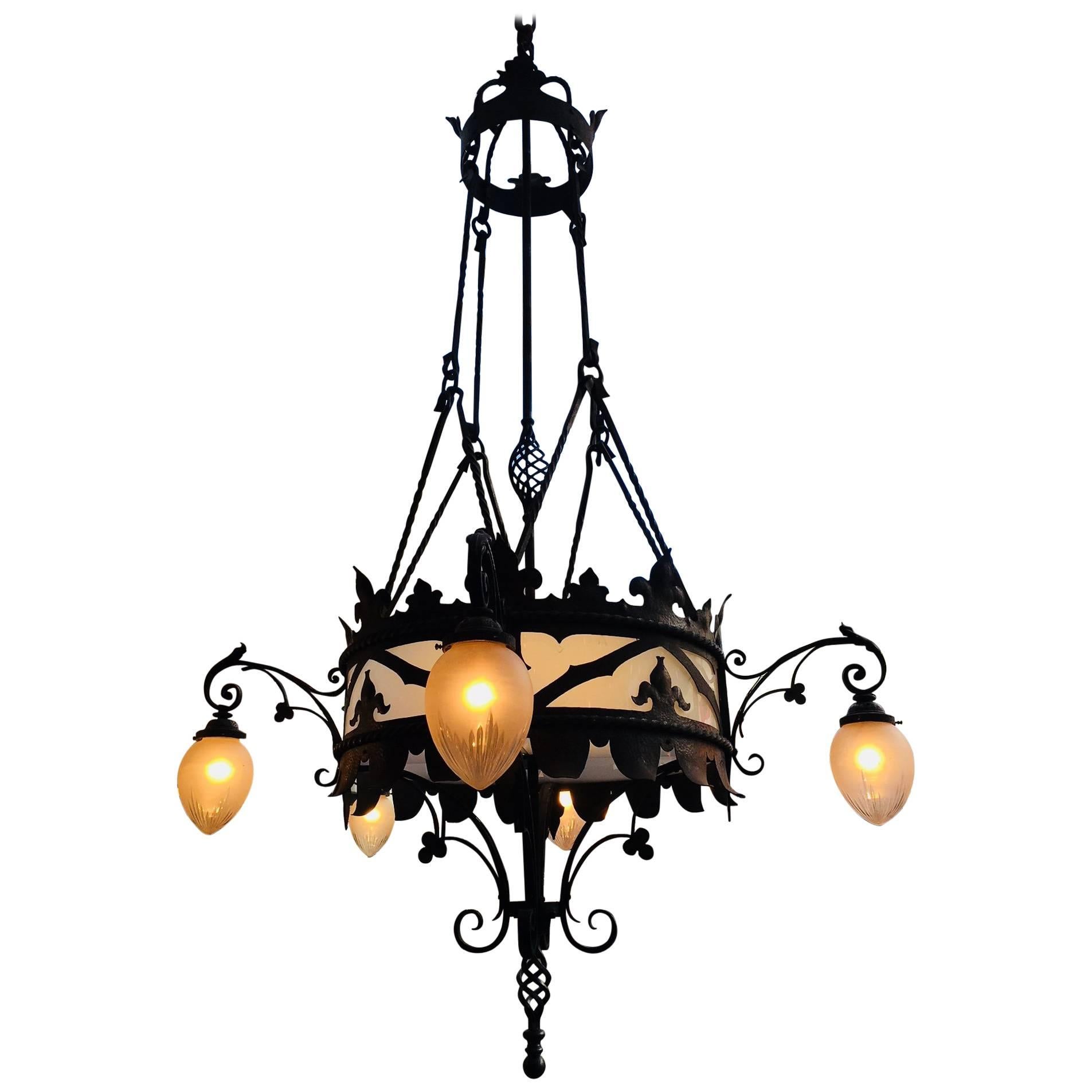 Large set of French Gothic Wrought Iron Chandeliers For Sale
