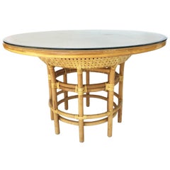 Vintage Leather Rattan Bamboo Round Dining Table in the Manner of Brown Jordan