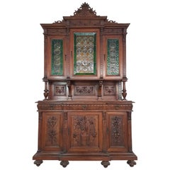 19th Century Italian Renaissance Style Walnut Carved Colored Glasses Sideboards