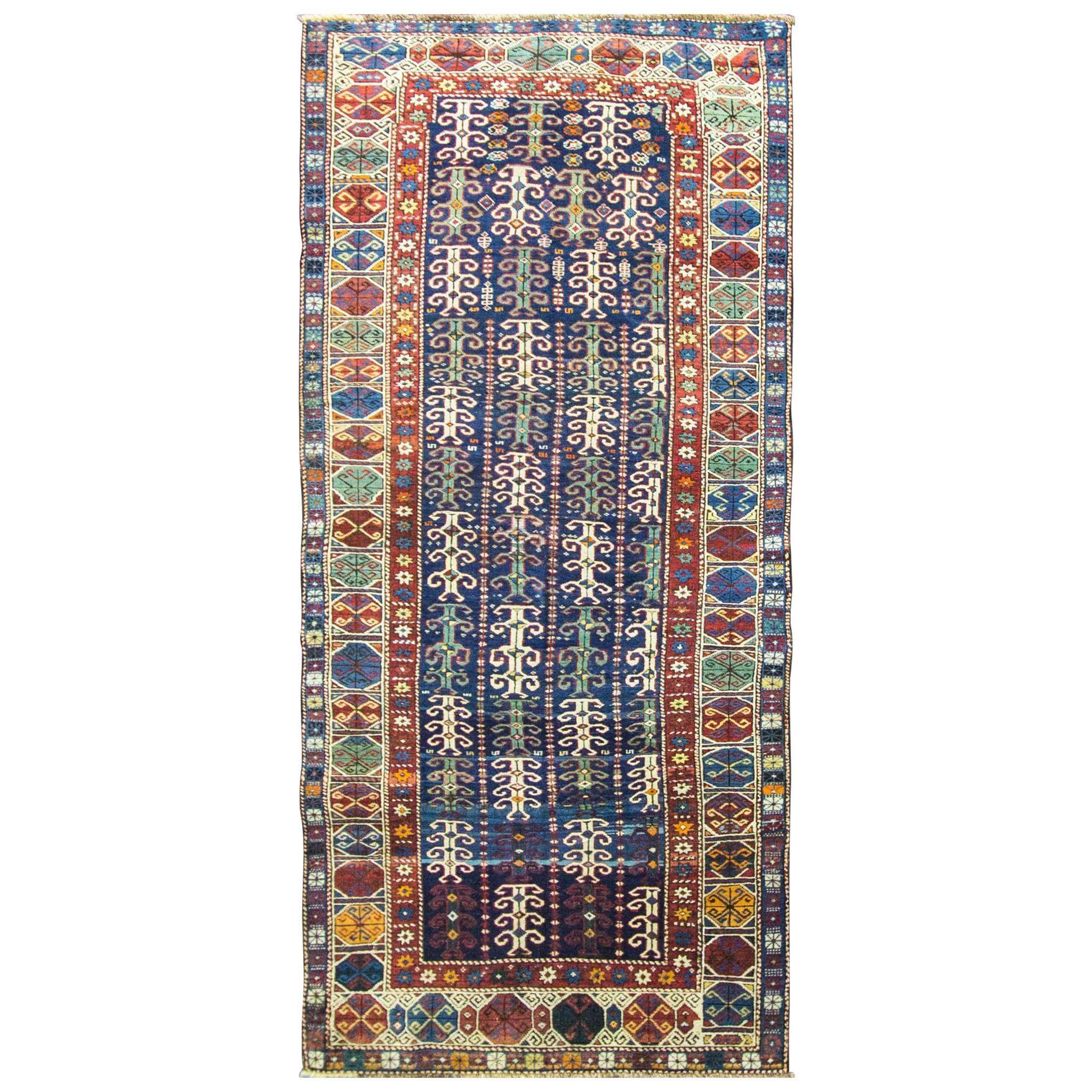 Antique Three of Life Long Kazak Rug, 4'3" x 7'9" For Sale