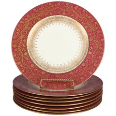 Huit assiettes plates anglaises en porcelaine fine dorée par George Jones Crescent & Sons