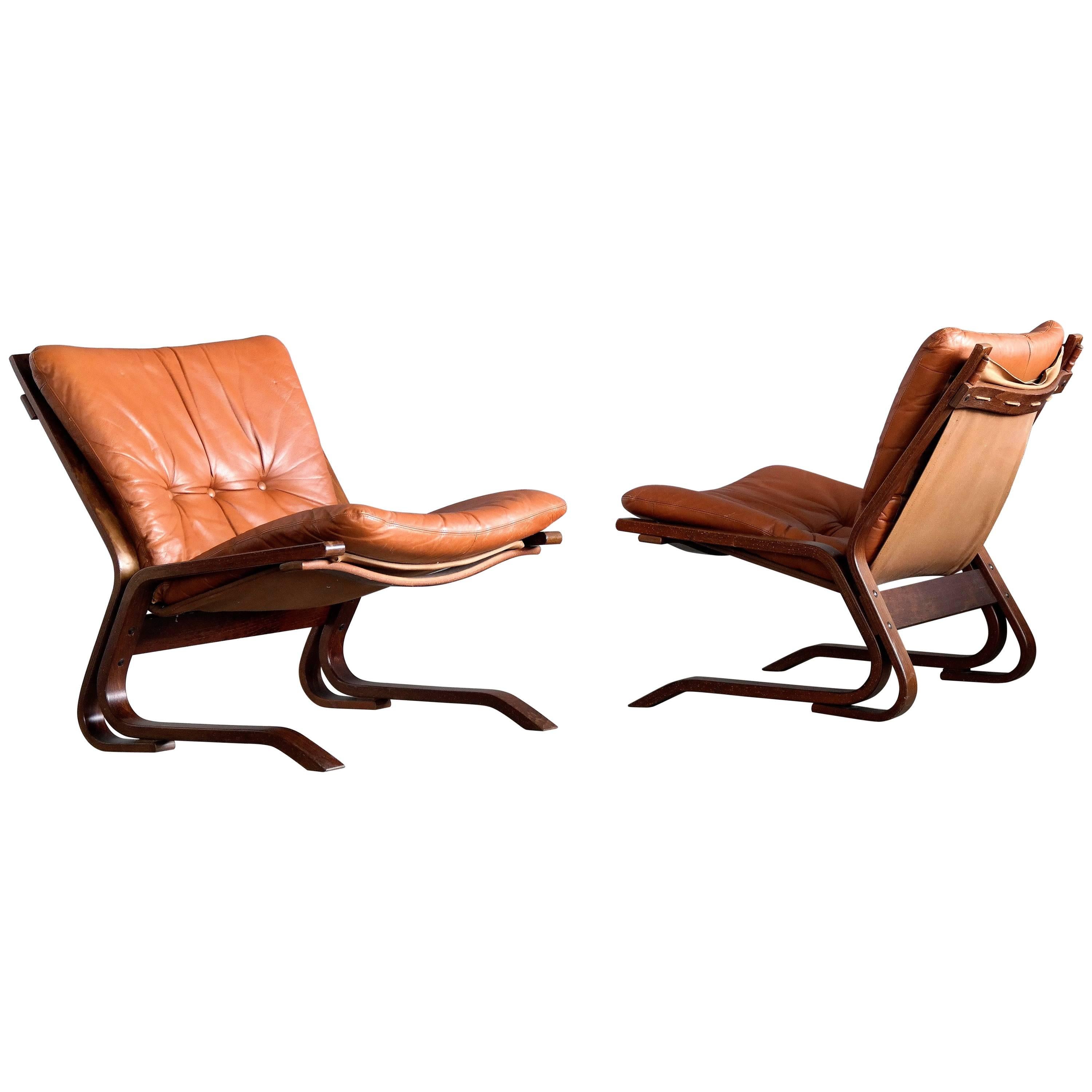 Pair of Midcentury Norwegian Easy Chairs in Cognac Leather by Oddvin Rykken