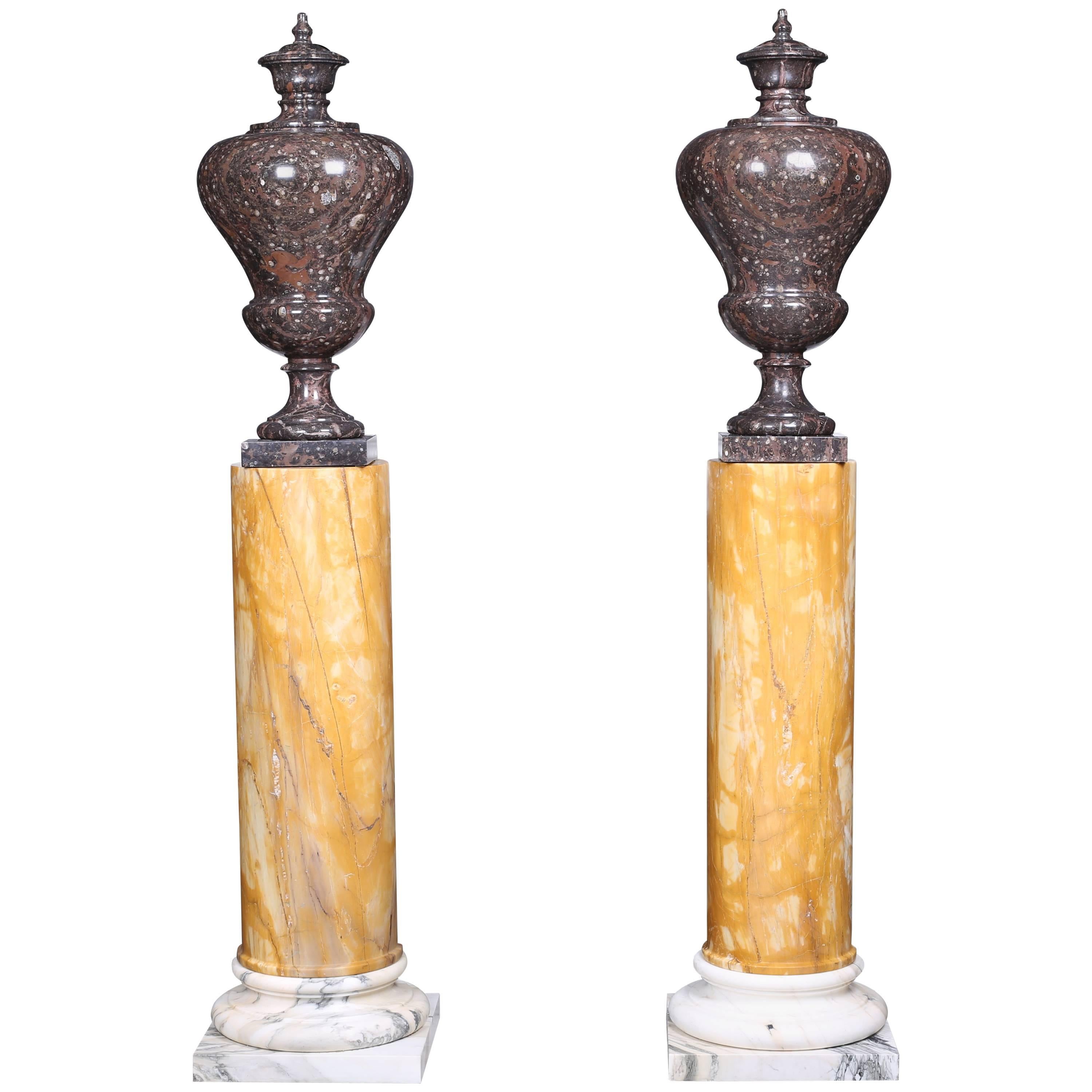 Vintage Grand Pair of Marble Urns on Column Plinths in the Neoclassical Style For Sale