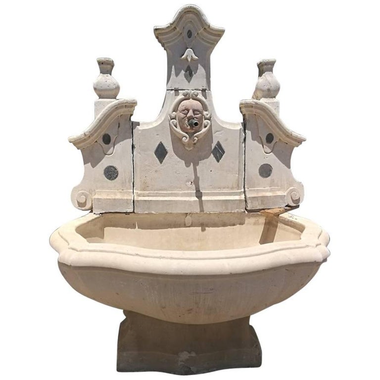 Italian stone and marble wall fountain, 1750, offered by Volubilis Art